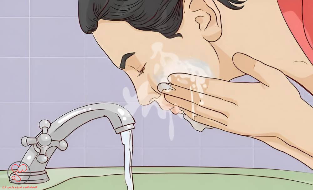 شستن صورت با آب سرد برای پایین آوردن ضربان قلب بالا
